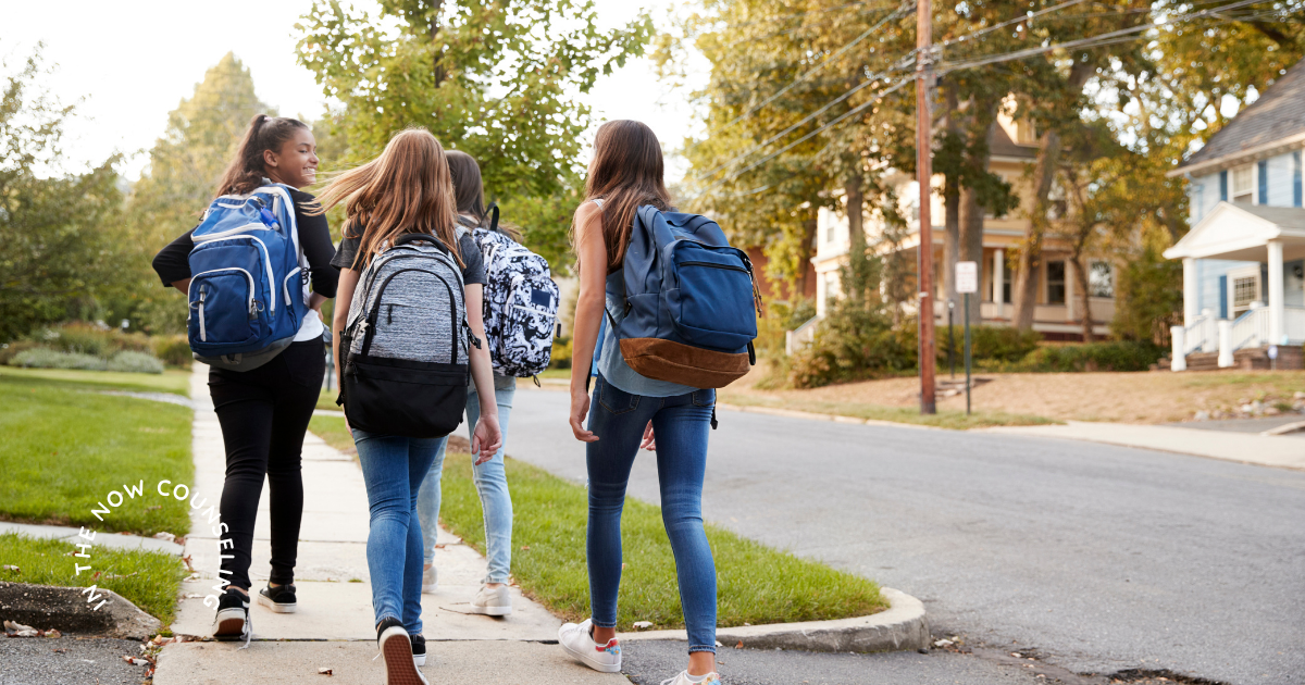 Teens walking together with backpacks on their way to back to school with anxiety